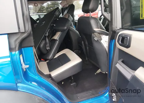 2023 Ford Bronco Wildtrak z USA, uszkodzony, nr VIN 1FMEE5DP4PLB12414